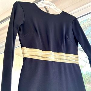 Long sleeve open back black dress